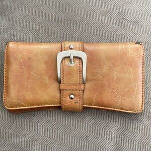 Mundi credit card holder/wallet. Never used however material is shedding. Brown
